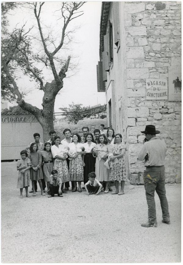 Group Portrait of the Gypsies next to Magasin du Sanctuaire, Saintes Maries de la Mer, France, 1953