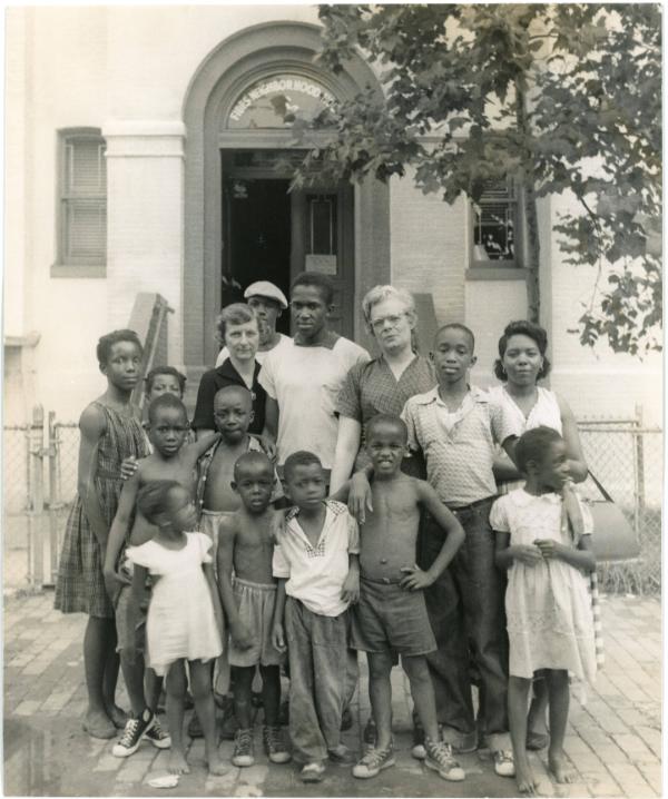 Dr. Mary Walsh with Children from Black Community, c. 1955