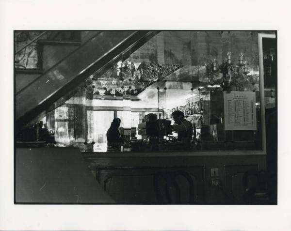 Man a Cash Register Behind Bar, ca. 1970s