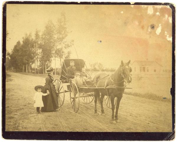 Family with Horse Drawn Wagon