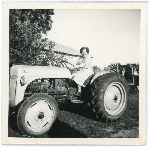 Woman on a Ford Tractor