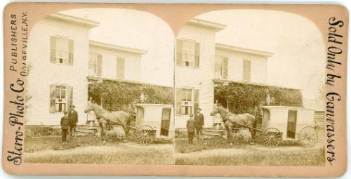 Two People and Horse Drawn Cart