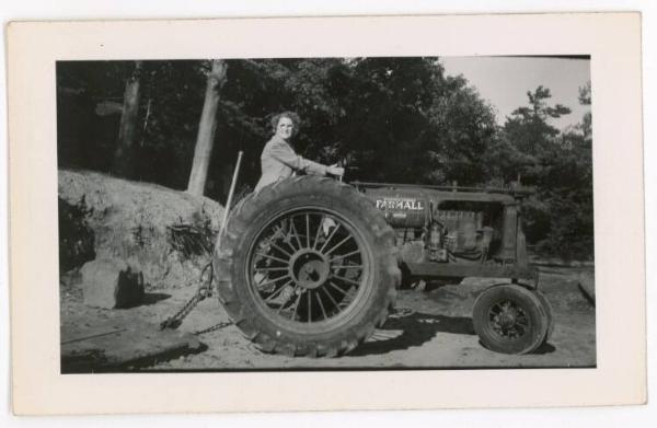 Lady on a Farmall Tractor 1