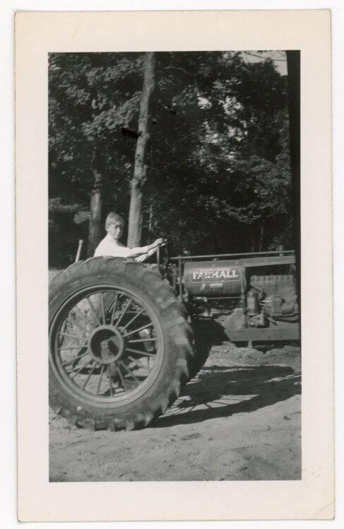 Boy on a Farmall Tractor 2