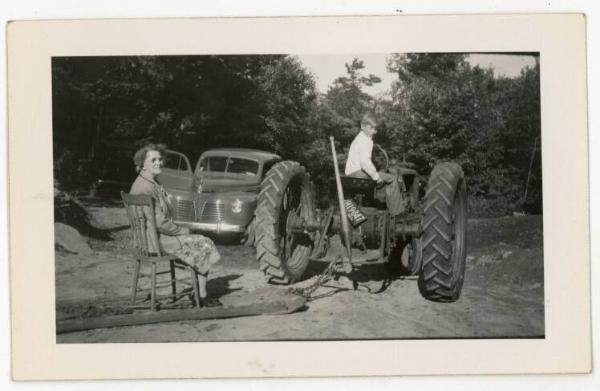 Lady & Boy with  Farmall Tractor 1