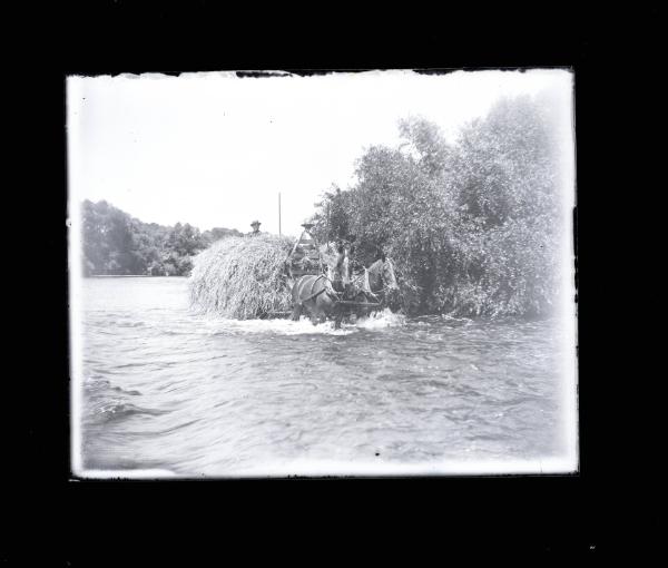 Loaded Hay Wagon in Water