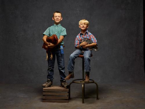 Gavin and Henry with  “Big Red” and  “Princess”