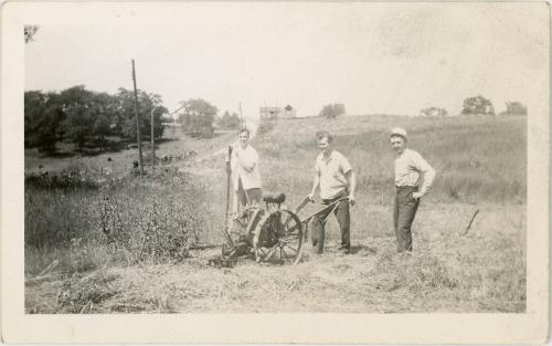 Three Men and a Post Setter