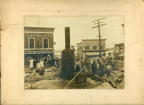 Men Gathering Around a Boiler