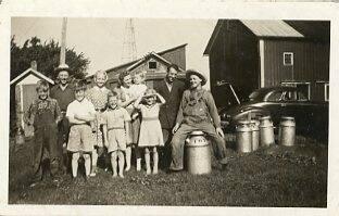 Family Group, Farm and Milk Cans