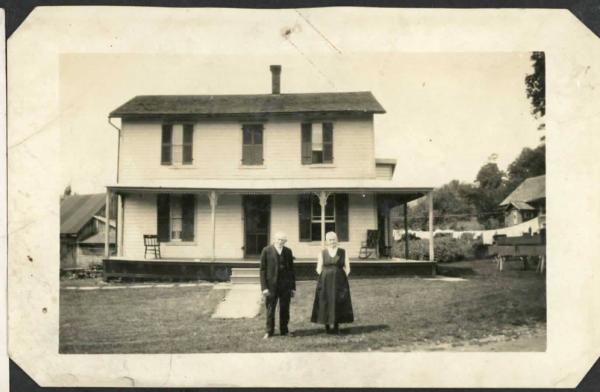 Couple in Front of the House