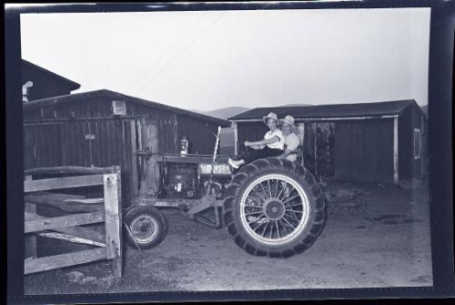 Embracing on a Tractor