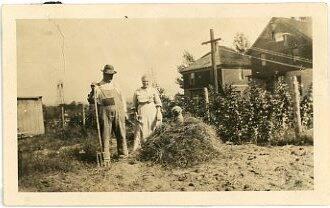 Couple with Hay and a Dog