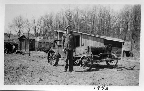 Boy with New Manure Spreader