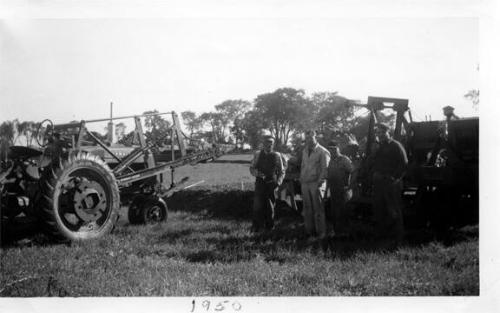 Farmall Tractor with Power Loader and Ditching Machine