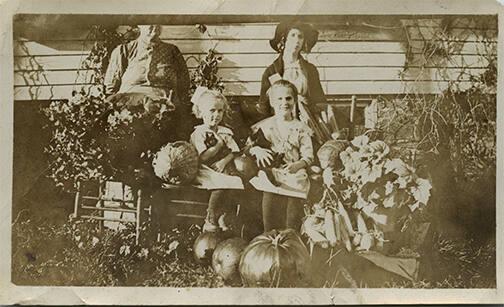 Two Girls with Produce  
