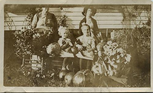 Two Girls with Produce  
