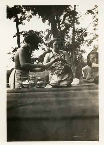 Three Women with Preserved Food 
