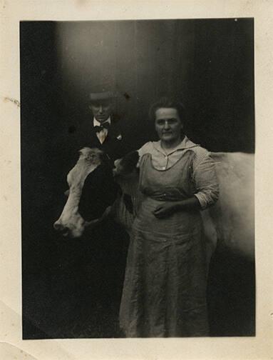 Man and Woman with a Cow 
