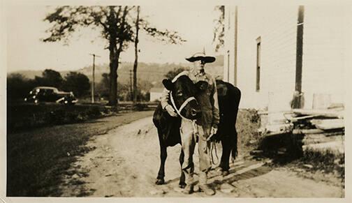 Man with Cow 
