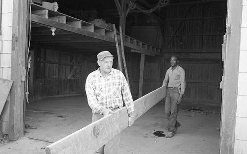 Portrait of Two Farmworkers 4