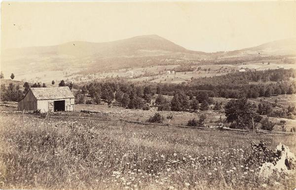 Barn Surrounded by Pasture 
