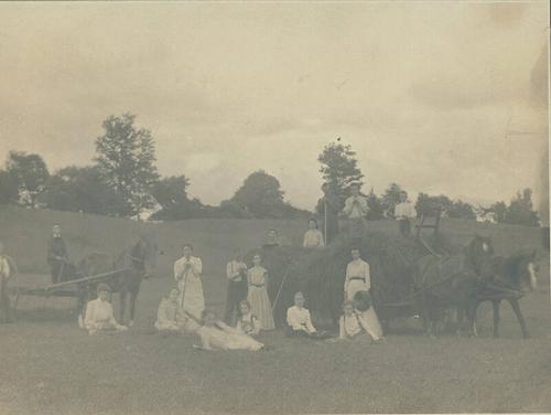 Doyle Family Posed in a Hay Field 
