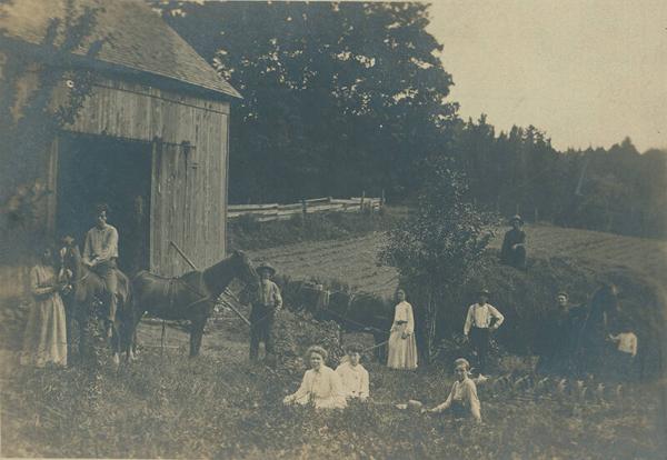 Doyle Family Members with Barn 
