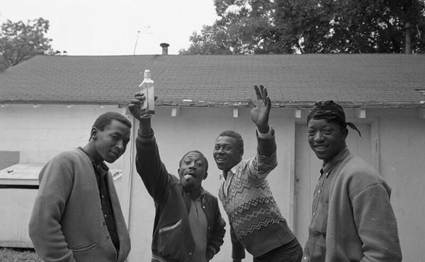 Four Men Outside a Building 2