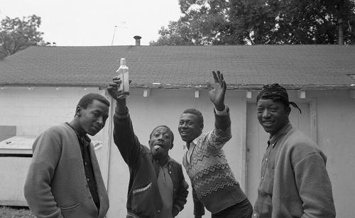 Four Men Outside a Building 2