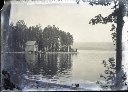 Woman Near Building on Water