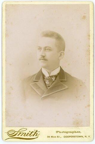 Portrait of a Man with a Leaf Design Tie