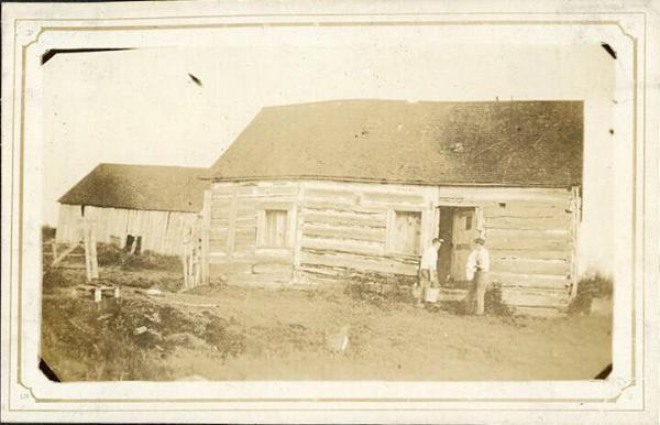 Two People at Building Door