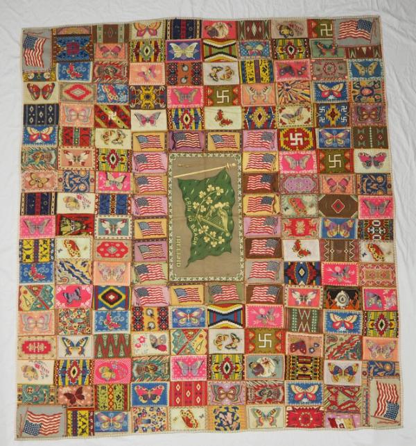 Cigarette premium quilt made up of flannel rectangles printed with butterflies, American flags,…