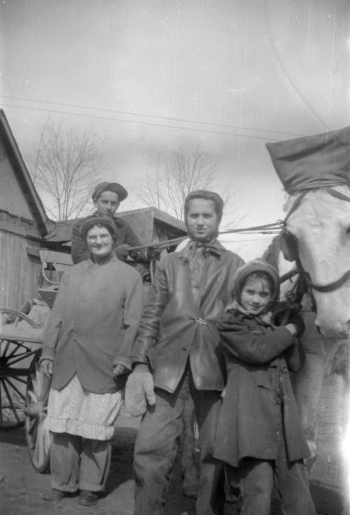 Dezemo Family with a Horse