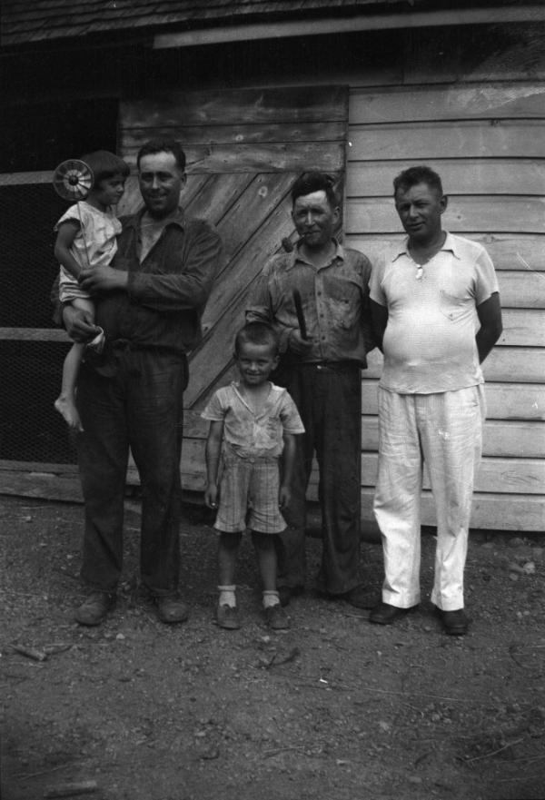 Three Dezemo Men with Two Children