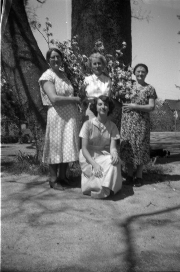 Four Women with Flowers
