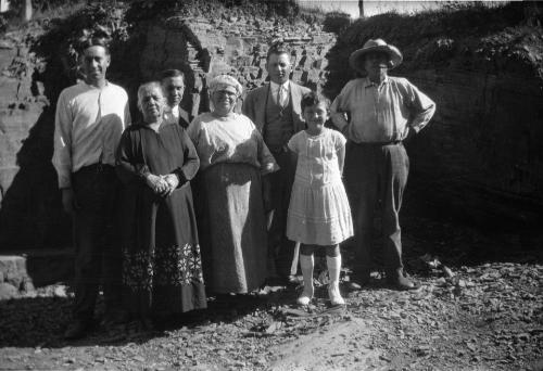 Four Men, Two Women and a Young Girl