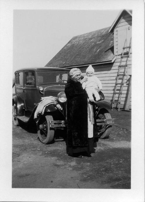 Woman with Baby and Car