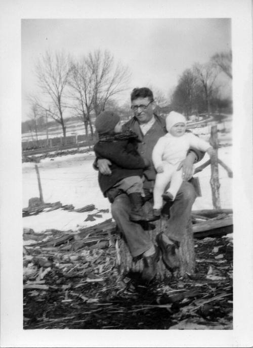 Man with a Baby and Toddler