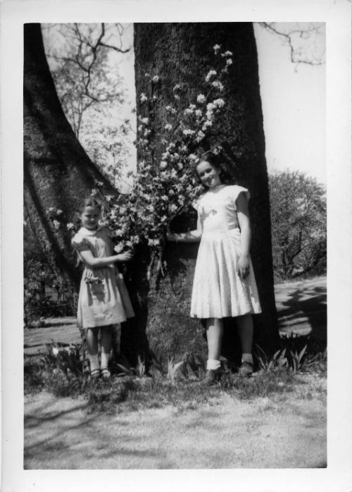 Two Girls with Flowers