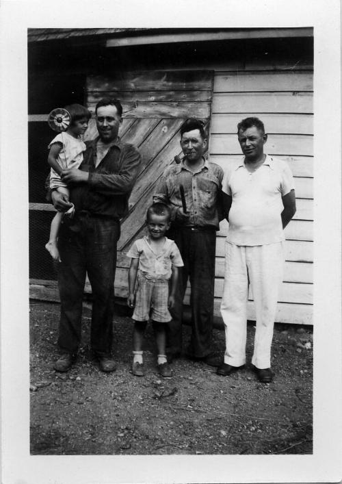 Three Dezemo Men with Two Children