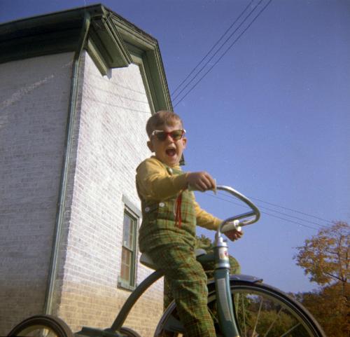David Garretson on a Tricycle