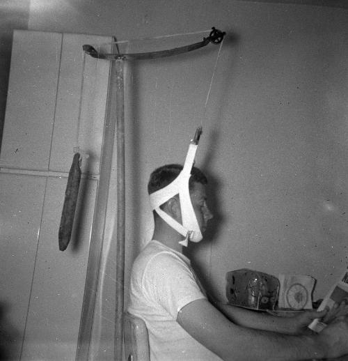 Edward Garretson in a Stretching Apparatus