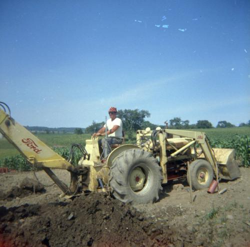 Noel Smith Digging a Ditch at Twin Brook Farms
