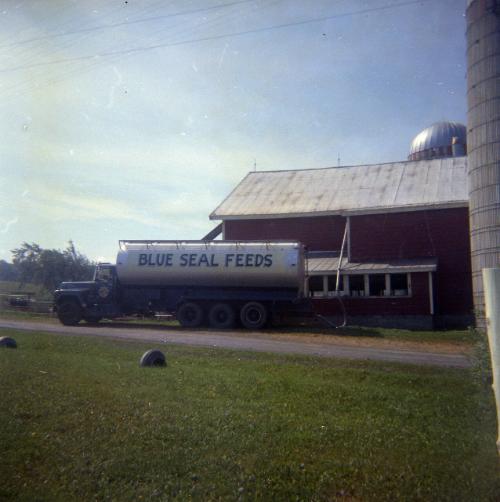 Blue Seal Feed Truck Delivering Grain