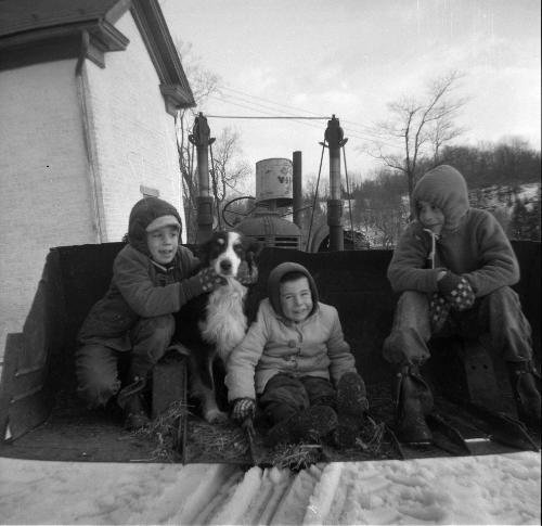 William, James and Tom Garretson with dog