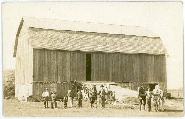 Farm Family with Barn and Horses