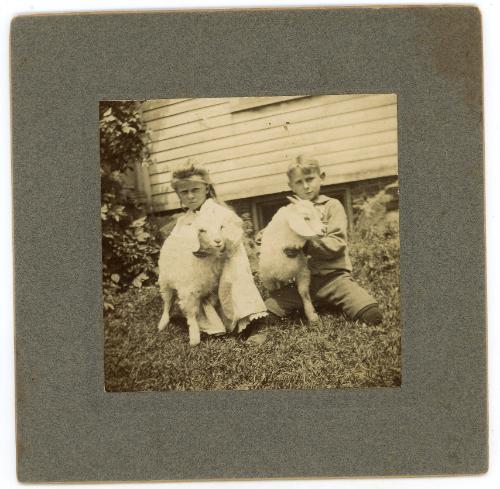 Two Children with Lambs