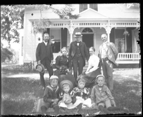 Family Posed in Front of Home; Morris, NY